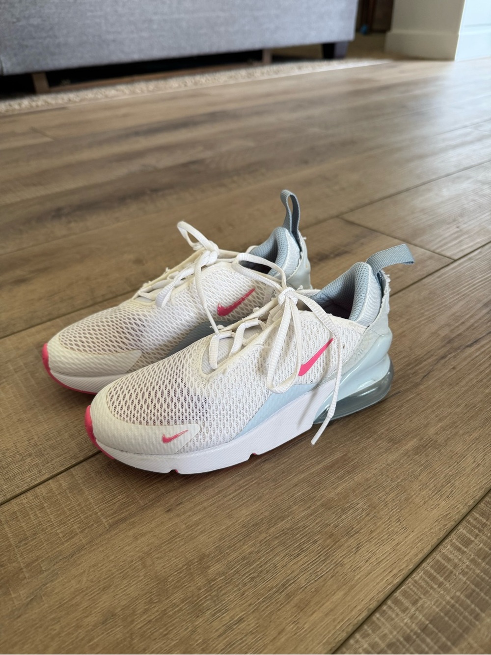 Nike White Sneakers with Pink Swoosh and Gray Heel